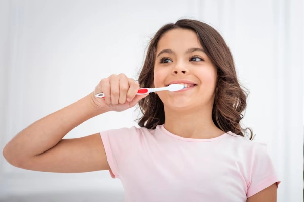 dentist examining little girl